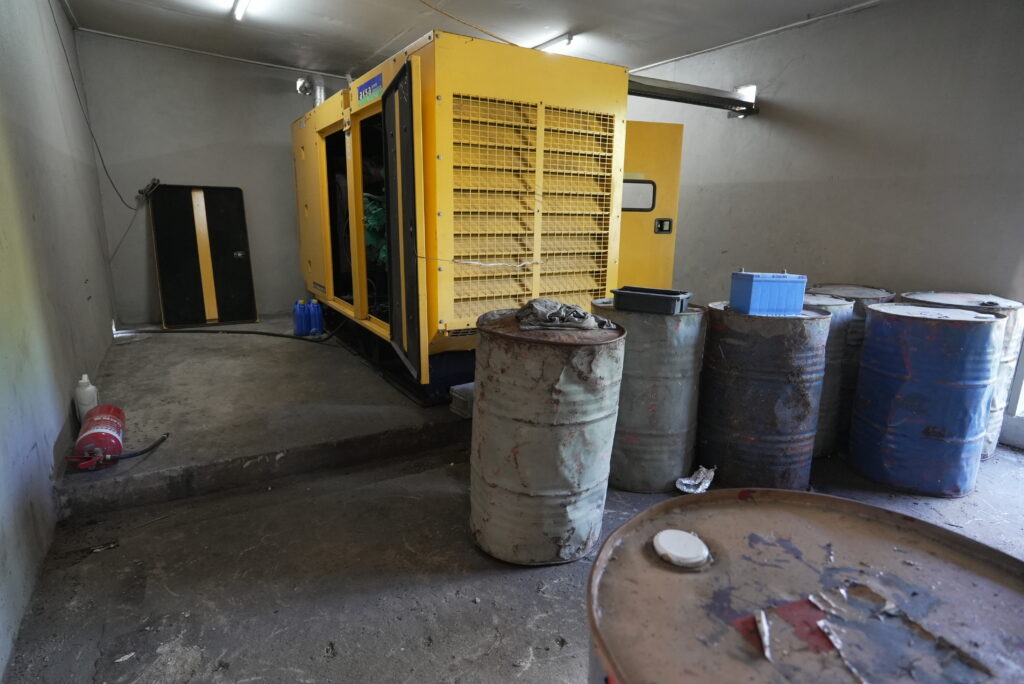 Generator and oil barrels