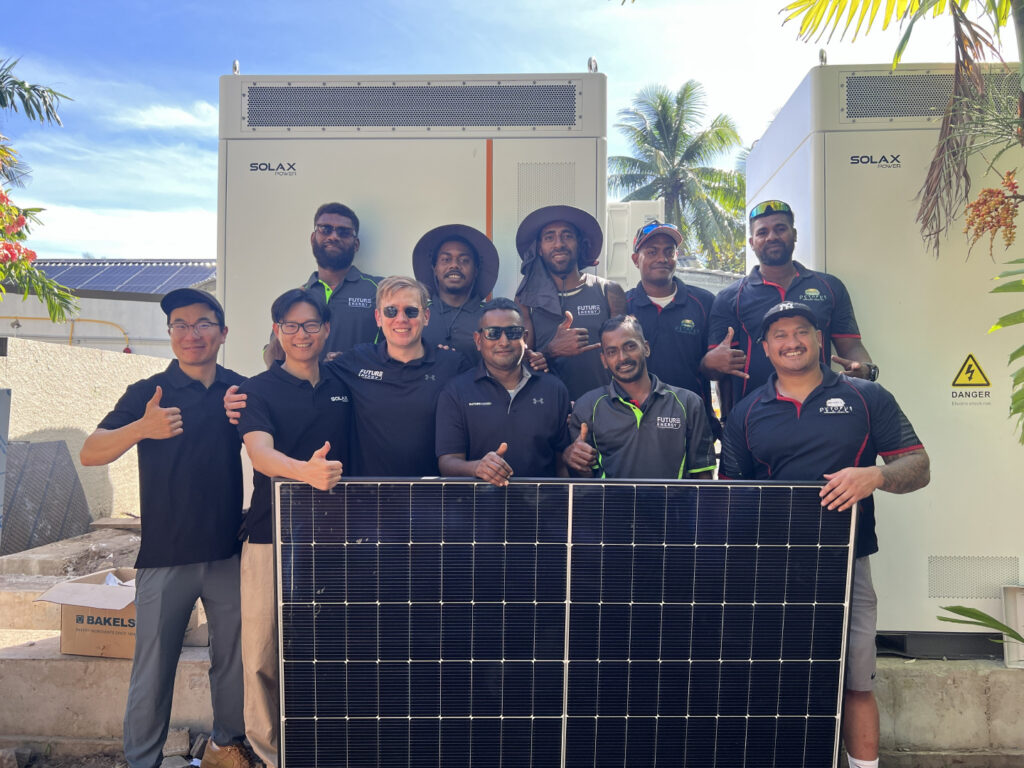 Future Energy and SolaX team installing solar panels at Octopus Resort, Fiji