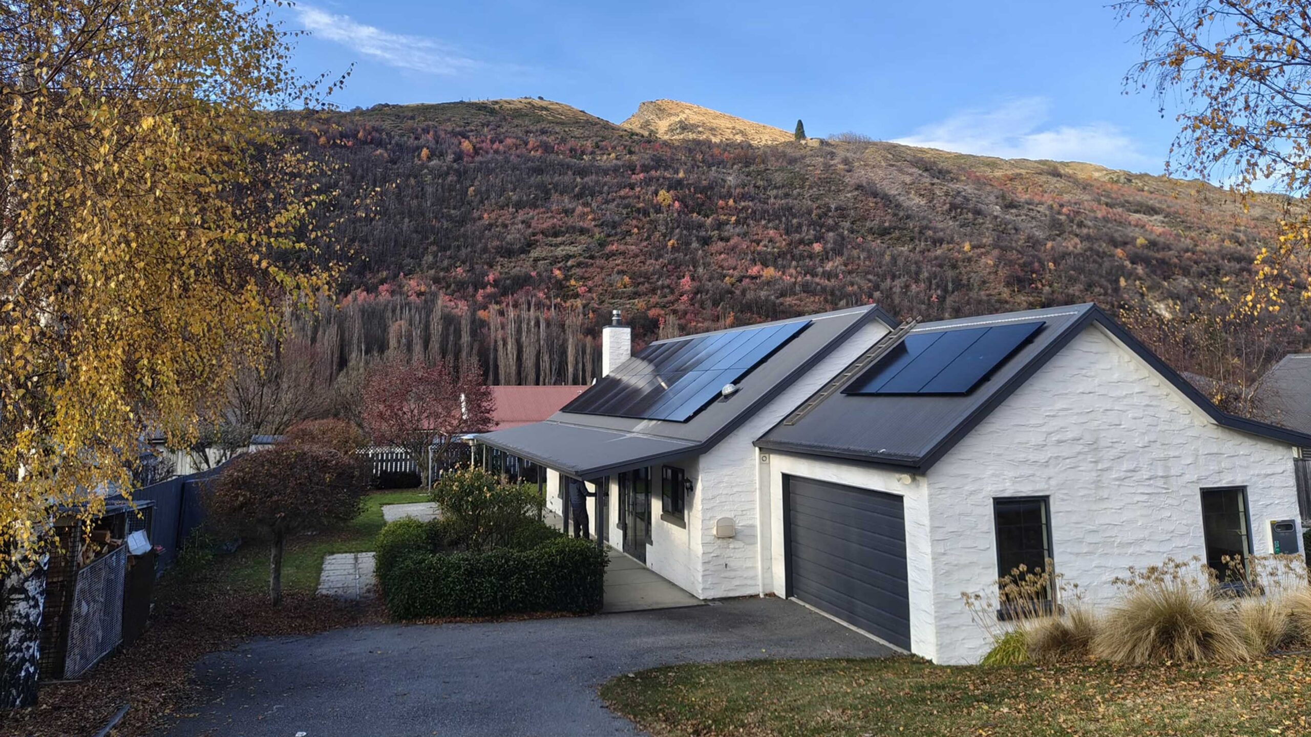 Solar battery storage NZ system installed on an Arrowtown home, 23 Suntech panels with Tesla Powerwall 3